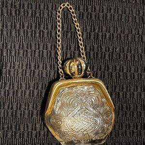 Vintage “Avon Purse Petite” bottle.